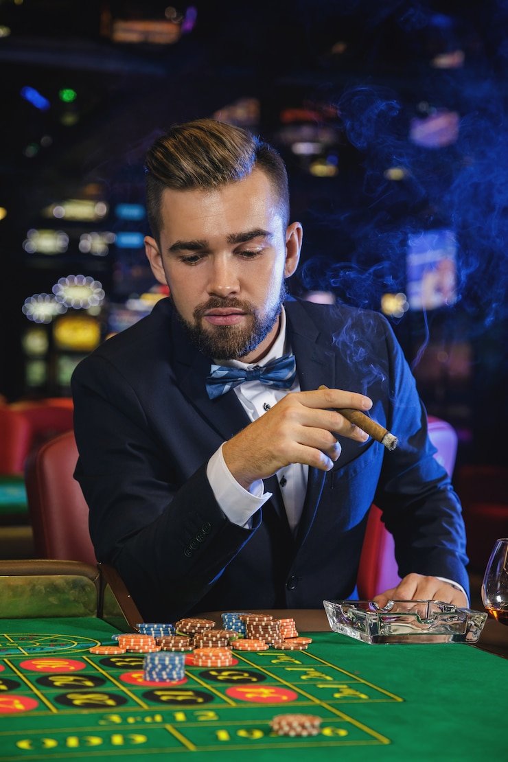 Mobile phone displaying wanitabet Quick Bet live casino interface with table list